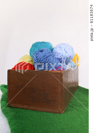Bright colorful balls of yarn on white background. Bright colorful balls of yarn on white background. 81183674