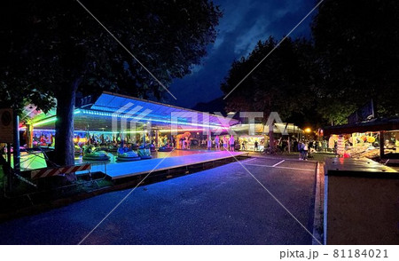 fairground by night in the village of idro in italy 81184021