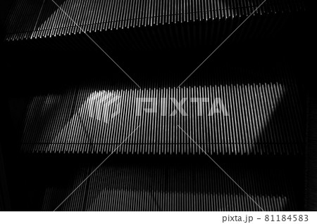 black and white stainless steel escalator close up black and white stainless steel escalator close up 81184583