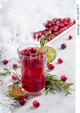 Christmas cranberry drink with berries, lime, and rosemary. Christmas cranberry drink with berries, lime, and rosemary. 81185877