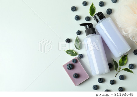 Natural bath cosmetics and blueberry on white background 81193049