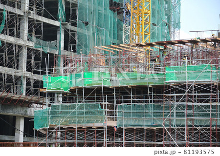 MALACCA, MALAYSIA -JULY 29, 2016: Construction site in progress at Malacca, Malaysia during daytime. Daily activity is ongoing. MALACCA, MALAYSIA -JULY 29, 2016: Construction site in progress at Malacca, Malaysia during daytime. Daily activity is ongoing. 81193575