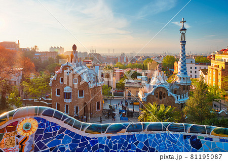 Barcelona city view from Guell Park. Sunrise view of colorful mosaic building in Park Guell 81195087