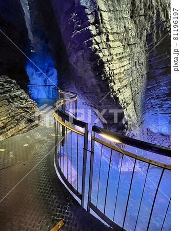 waterfall in cave with colored lights cascate del varone waterfall in cave with colored lights cascate del varone 81196197