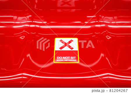 Do not sit here sticker red X sign on seat in train,Social distancing for covid-19 or coronavirus outbreak 81204267