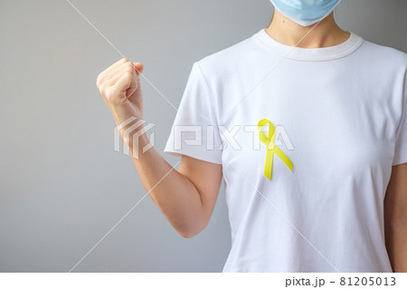 Yellow Ribbon for supporting people living and illness. September Suicide prevention day, Childhood, Sarcoma and bone cancer awareness month concept 81205013