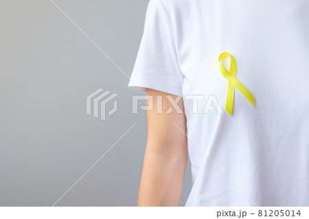 Yellow Ribbon for supporting people living and illness. September Suicide prevention day, Childhood, Sarcoma and bone cancer awareness month concept 81205014