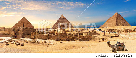 Giza Pyramids and Sphinx panorama with a camel lying by, Cairo, Egypt Giza Pyramids and Sphinx panorama with a camel lying by, Cairo, Egypt 81208318