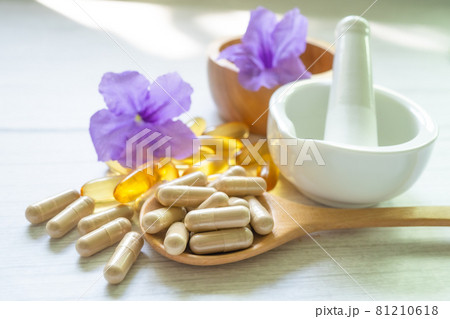 Alternative medicine herbal organic capsule with vitamin E omega 3 fish oil, mineral, drug with herbs leaf natural supplements for healthy good life. Alternative medicine herbal organic capsule with vitamin E omega 3 fish oil, mineral, drug with herbs leaf natural supplements for healthy good life. 81210618