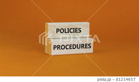 Policies and procedures symbol. Wooden blocks with concept words Policies procedures on orange background. Business and policies and procedures concept. Copy space. Policies and procedures symbol. Wooden blocks with concept words Policies procedures on orange background. Business and policies and procedures concept. Copy space. 81214657