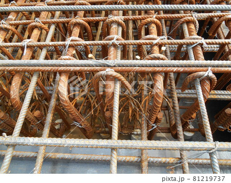 SELANGOR, MALAYSIA -MAY 18, 2016: Hot rolled deformed steel bars or steel reinforcement bar tied together before cast in the concrete. Its function is to increase the concrete strength. SELANGOR, MALAYSIA -MAY 18, 2016: Hot rolled deformed steel bars or steel reinforcement bar tied together before cast in the concrete. Its function is to increase the concrete strength. 81219737