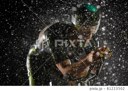 triathlon athlete riding bike fast on rainy night triathlon athlete riding bike fast on rainy night 81223502