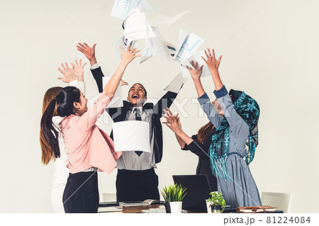 Business people throwing papers in the office. 81224084