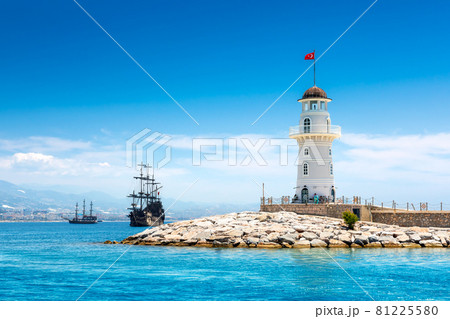 Landscape view with wooden sailing ships and Alanya port lighthouse, Alanya, Turkey Landscape view with wooden sailing ships and Alanya port lighthouse, Alanya, Turkey 81225580