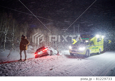 car accident on slippery winter road at night car accident on slippery winter road at night 81229733
