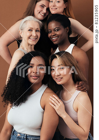 Portrait of six women of different ages looking at camera in studio Portrait of six women of different ages looking at camera in studio 81235905