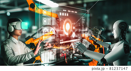 Mechanized industry robot and human worker working together in future factory Mechanized industry robot and human worker working together in future factory 81237147