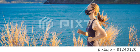 BANNER, LONG FORMAT Runner wearing medical mask, Coronavirus pandemic Covid-19. Sport, Active life in quarantine surgical sterilizing face mask protection. Outdoor run on athletics track in Corona BANNER, LONG FORMAT Runner wearing medical mask, Coronavirus pandemic Covid-19. Sport, Active life in quarantine surgical sterilizing face mask protection. Outdoor run on athletics track in Corona 81240120