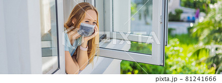 BANNER, LONG FORMAT Extremly tired woman looking out the window, home alone. self-isolation at home, quarantine due to pandemic COVID 19. Mental health problems in self-isolation at home, quarantine 81241666