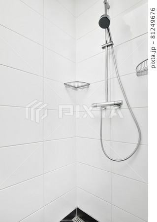 Modern shower stall in a bright bathroom Modern shower stall in a bright bathroom 81249676
