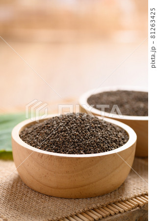 Perilla seeds in a bowl on wooden background, Healthy herbal seed ingredients in Asian food 81263425