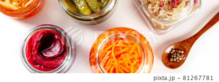Fermented foods panorama on a white background. Pickled carrot, beetroot etc Fermented foods panorama on a white background. Pickled carrot, beetroot etc 81267781
