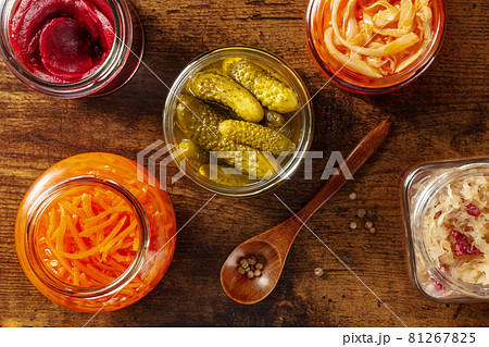 Fermented food, overhead flat lay shot of a variety of pickled vegetables Fermented food, overhead flat lay shot of a variety of pickled vegetables 81267825