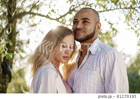 Close up of young couple in love enjoying time together outdoors 81270195