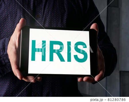 Manager shows HRIS human resource information system on the tablet. 81280786