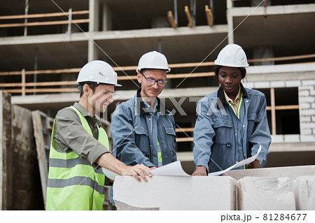 Group of Engineers Discussing Construction Plans Group of Engineers Discussing Construction Plans 81284677