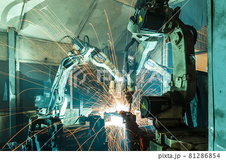 Team robot welding steel motion blur industry. 81286854
