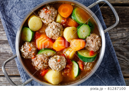 hot mexican meatball vegetable soup, top view 81287100