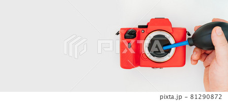 service and cleaning of the camera from dust and dirt with air from rubber pear service and cleaning of the camera from dust and dirt with air from rubber pear 81290872