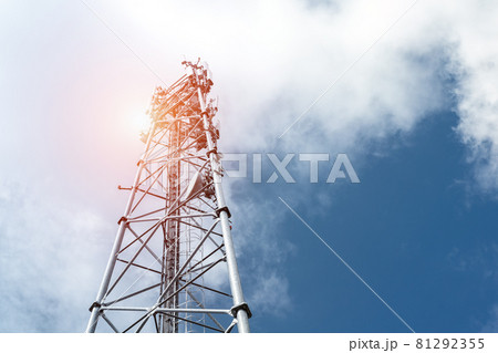 Bottom perspective pov of modern metal steel mobile 5g network wireless telecom tower against clear blue sky background on bright day. Microwave signal broadband equipment base line station mast Bottom perspective pov of modern metal steel mobile 5g network wireless telecom tower against clear blue sky background on bright day. Microwave signal broadband equipment base line station mast 81292355