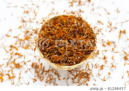Dried marigold flower petals on white background. Flower herbal tea concept. 81296457