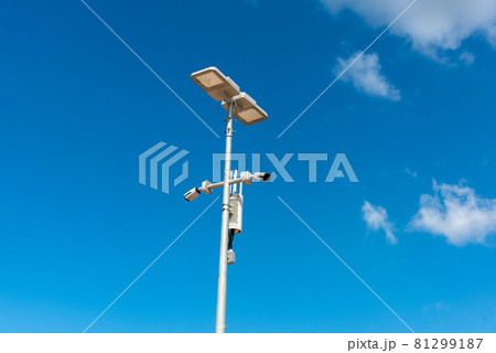 CCTV camera with blue sky background. Close-up of outdoor surveillance cameras on a street pole, Ensuring security on the street.. CCTV camera with blue sky background. Close-up of outdoor surveillance cameras on a street pole, Ensuring security on the street.. 81299187