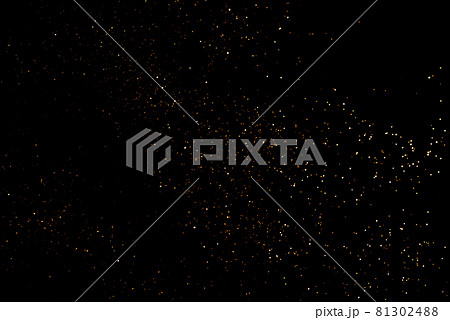Golden abstract bokeh on black background. 81302488