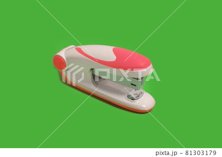stapler on a green background. school and office accessories 81303179