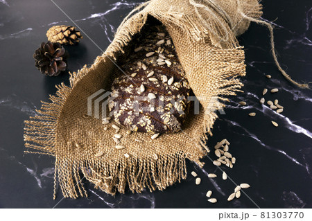Rye bread baked with sesame , linseeds and sunflower seeds. Rye bread baked with sesame , linseeds and sunflower seeds. 81303770
