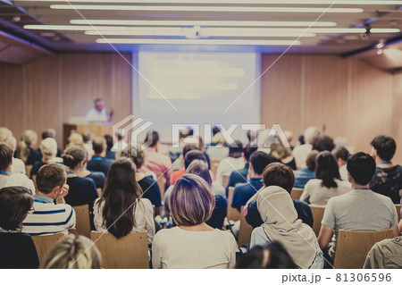 Audience in lecture hall on scientific conference. Audience in lecture hall on scientific conference. 81306596