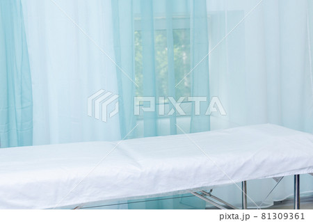 office interior in a health facility with exam table 81309361