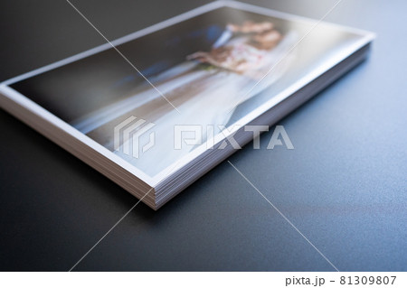 stack of wedding photos. the result of the photographer's work at the wedding. 81309807