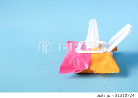 Cleansing wet wipes on blue with copy space  81310724