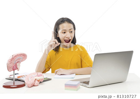 Asian little girl with laptop attending to online school class 81310727