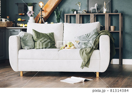 Fruits and wine on sofa at home Fruits and wine on sofa at home 81314384