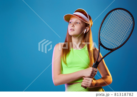 girl teenager with racket in sporswear and hat 81318782