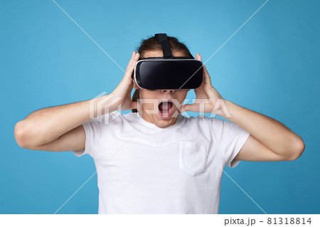 Young man using virtual reality headset. VR gadgets Young man using virtual reality headset. VR gadgets 81318814
