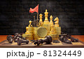 Bright chess with cannon and red victory flags on gold coins in dark brick background. Dark chess was defeated and destroyed, strewn across the chessboard. Concept business success. 81324449