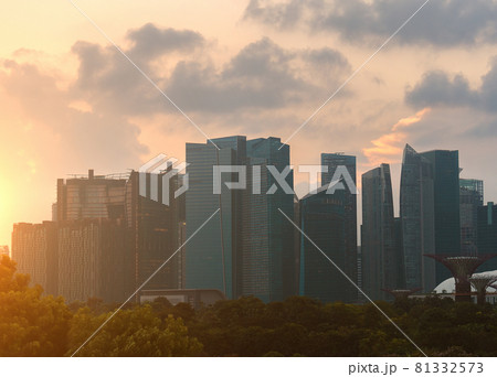 Business buildings in city at sunset Business buildings in city at sunset 81332573