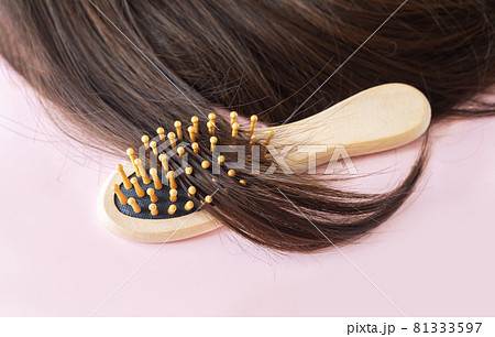 Shiny brown straight long hair with brush Shiny brown straight long hair with brush 81333597